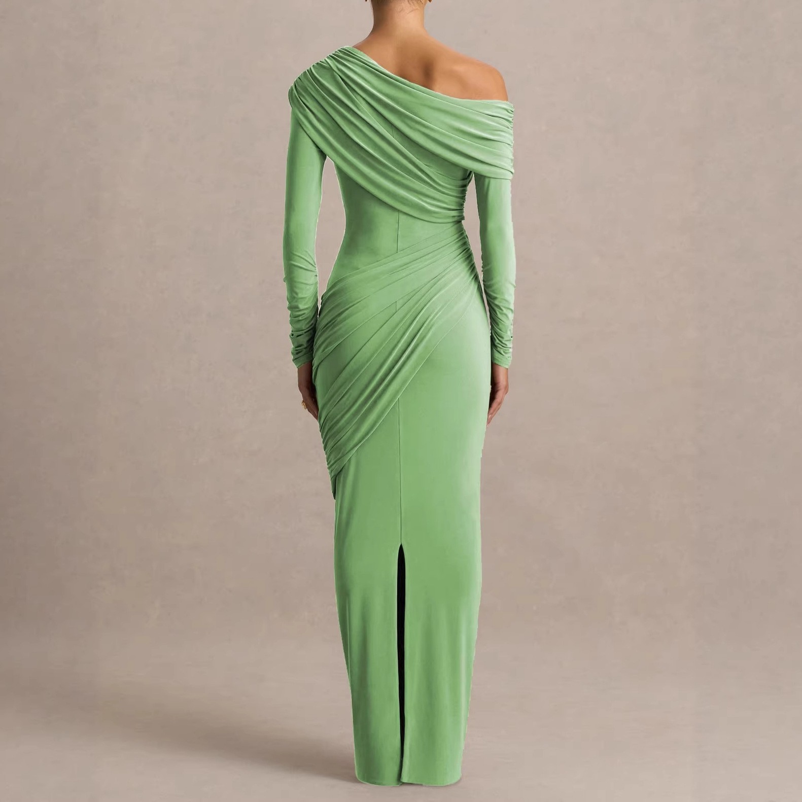 A pleated and frilled elegant light green full-skirted dress with a slanted neckline